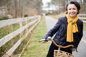 older woman riding a bike